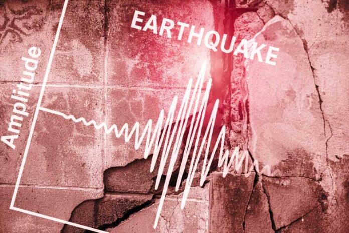 Earthquake,Concept,Crack,Damaged,Concrete,Cement,Building,From,Land,Moving Seismograph showing earthquake amplitude on a cracked wall