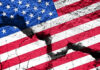 Pope’s July 4 Shock Attack On U.S. Cracked United States flag on textured surface.