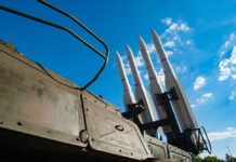 Patriot Crunch Sparks NATO Clash Surface-to-air missiles mounted on a military launcher under a blue sky