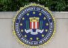 Judge SLAMS FBI HQ Switch FBI seal featuring stars and laurel leaves