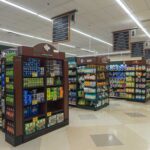 Walmart Spread Flagged — Hidden Danger Found Interior view of a grocery store aisle with shelves of food and beverages