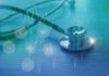 A stethoscope on a wooden surface with digital health icons and a heartbeat graph overlay