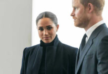 Security Scare Upends Harry, Meghan’s Plan Meghan Markle and Prince Harry in formal attire looking serious.