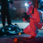 Harbor Shove Turns Deadly – MURDER? Forensic investigator examines crime scene at night.