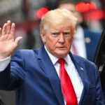 Donald Trump waving.