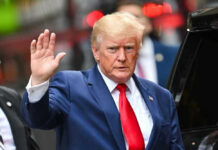 Donald Trump waving.