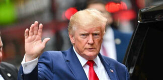 Donald Trump waving.