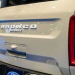 Ford and Filson’s Bronco Shocker: What’s Under the Hood? Rear view of a Ford Bronco Sport showcasing its branding