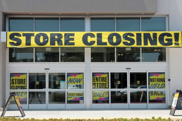 Storefront with a large 'STORE CLOSING!' banner and sale signs