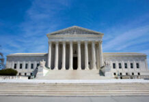Supreme Court Gets Trump To Surrender U.S. Supreme Court building under clear blue sky.