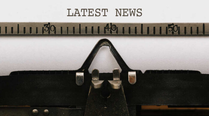 Latest,News,,Text,On,Paper,In,Vintage,Type,Writer,Machine Close-up of a typewriter with a sheet of paper displaying the words 'LATEST NEWS'