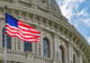 Shock Vote: Congress Draws a Red Line American flag in front of ornate building facade.