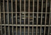 Eleventh-Hour Reversal Freezes THIS Execution?! Empty, rusty barred jail cell with metal bunks.