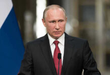 Putin Meeting Sparks Release Vladimir Putin speaking at a podium with a microphone