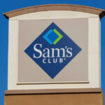 Sign for Sam's Club against a clear blue sky