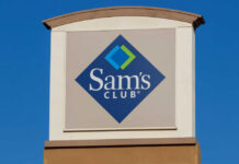 Sign for Sam's Club against a clear blue sky