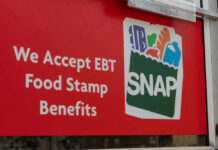 Food-Stamp Scam Ring Exposed Red sign showing SNAP EBT food stamp benefits