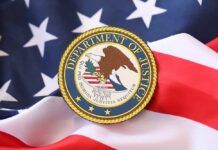 Cross-Border Plot Shocks DOJ Department of Justice seal on an American flag background