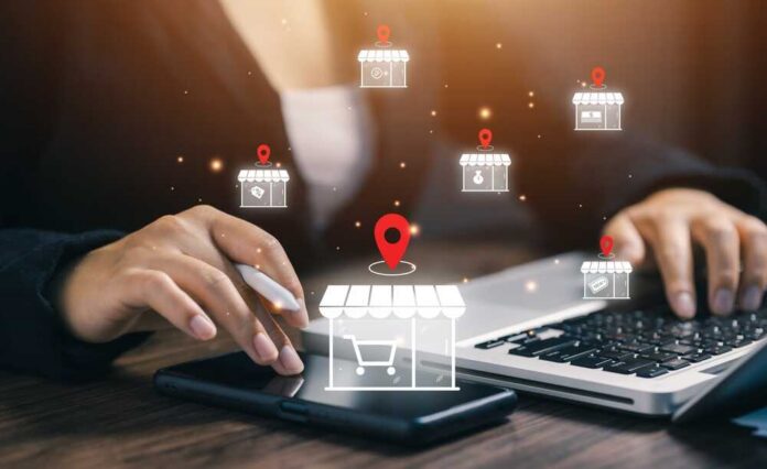 Person using a laptop and smartphone with digital shopping icons
